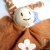 Doudou souriant en coton bio